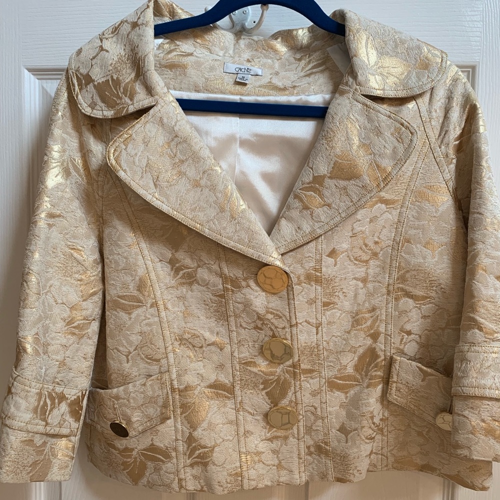 Unique, gold blazer.